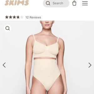 Skims high waisted sand thong. Some rips in seams from washer. Size S/M